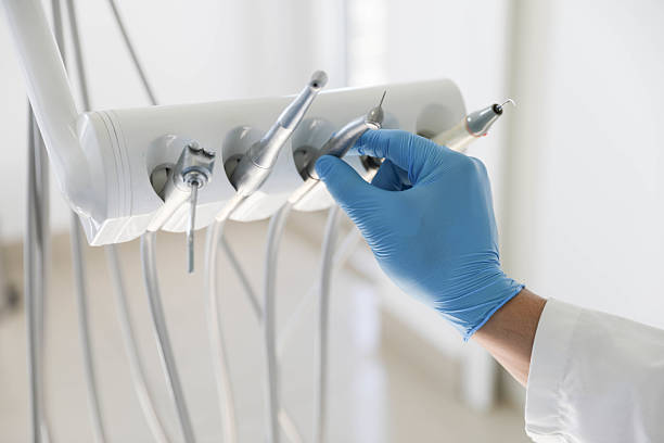 Professional Tooth Extraction technician working in Martin's Additions, MD